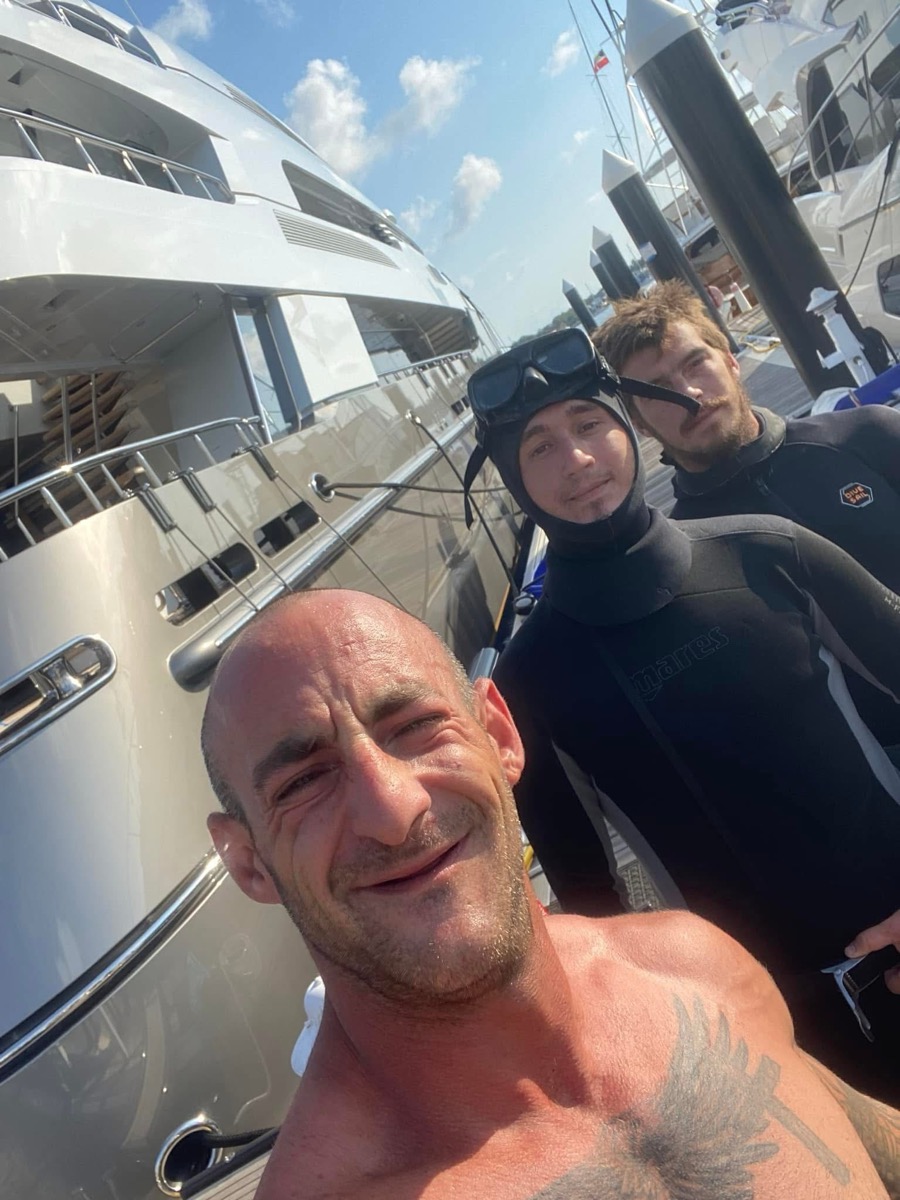 Davy Jones Divers team performing underwater maintenance in South Florida